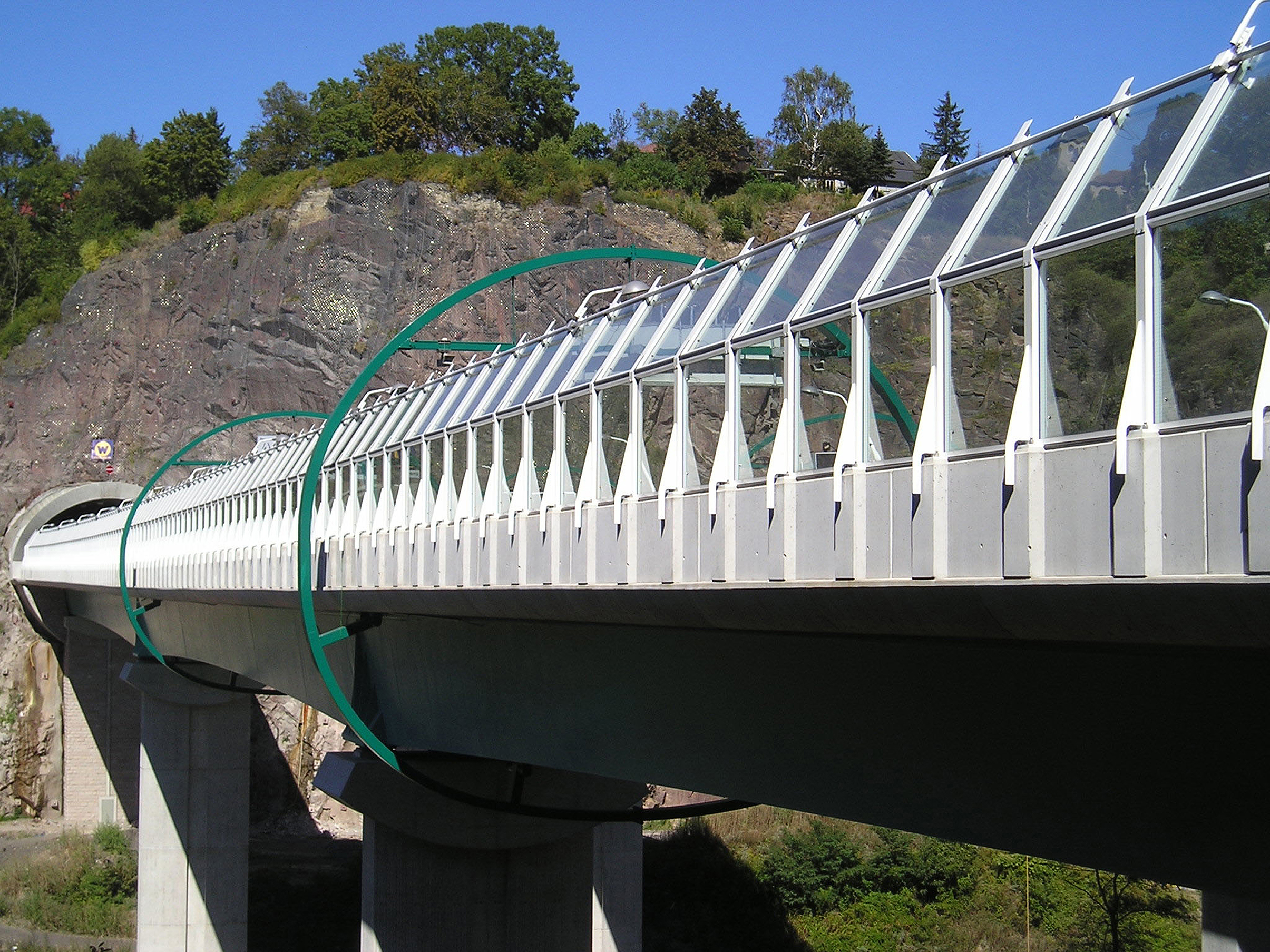 Transparent acrylic noise barrier along a railway line from Saferoad.